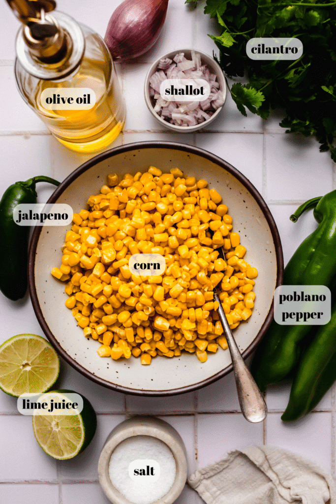 Ingredients for chipotle corn salsa labeled on counter.