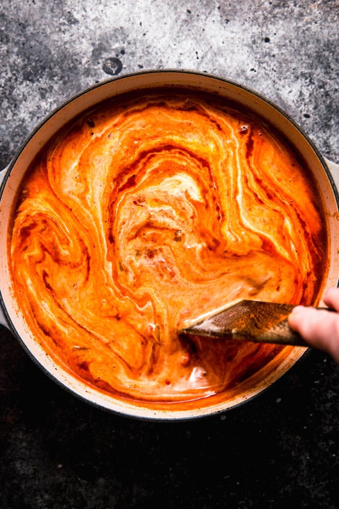 Coconut milk added to butter chicken soup.