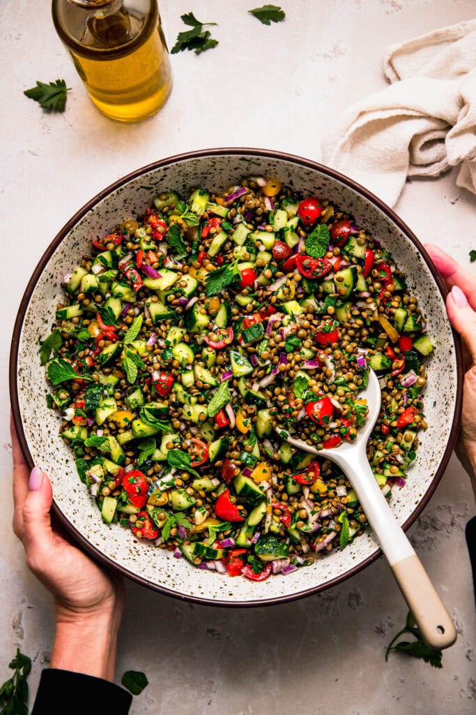 Finished lentil tabbouleh salad in serving bowl.
