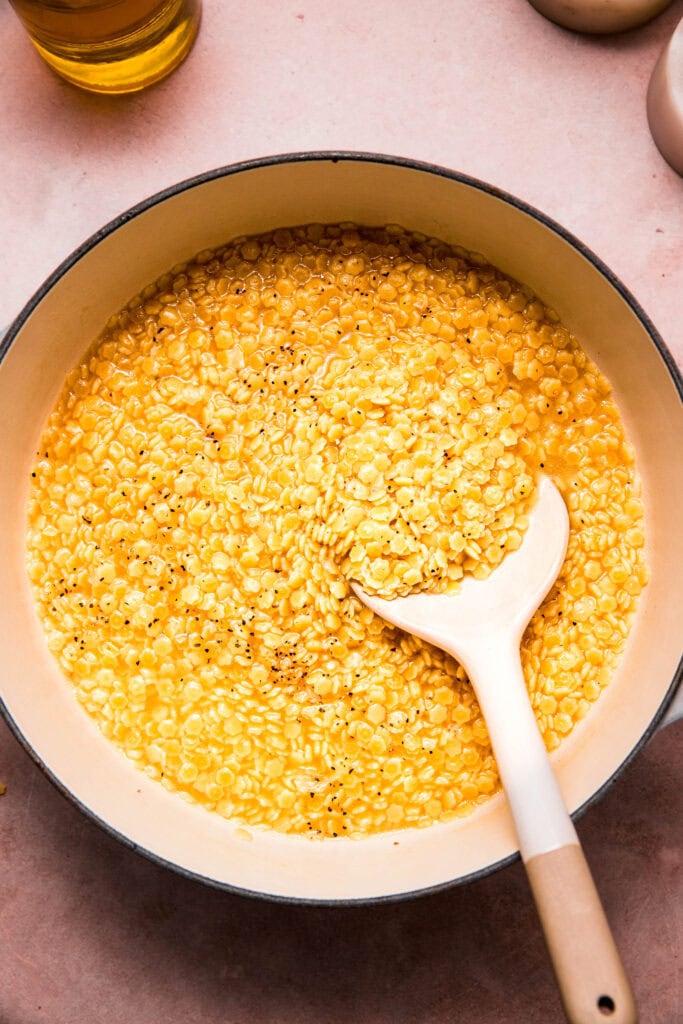 Pastina cooking in pot.