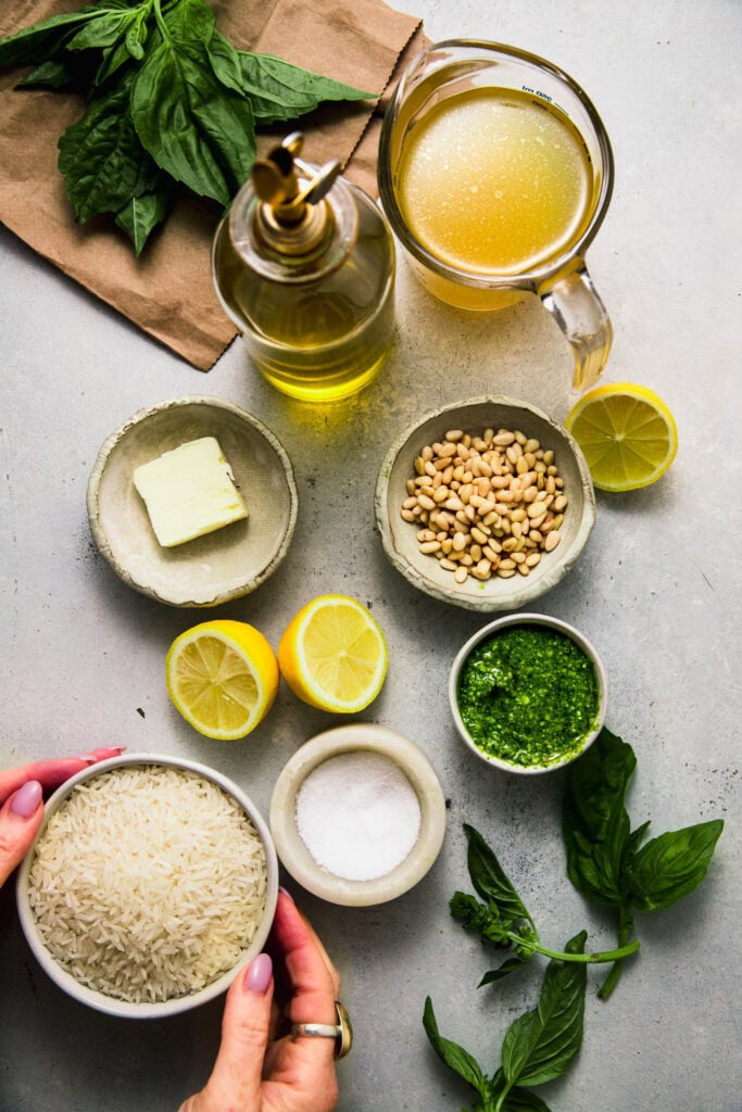 Ingredients for pesto rice on counter.