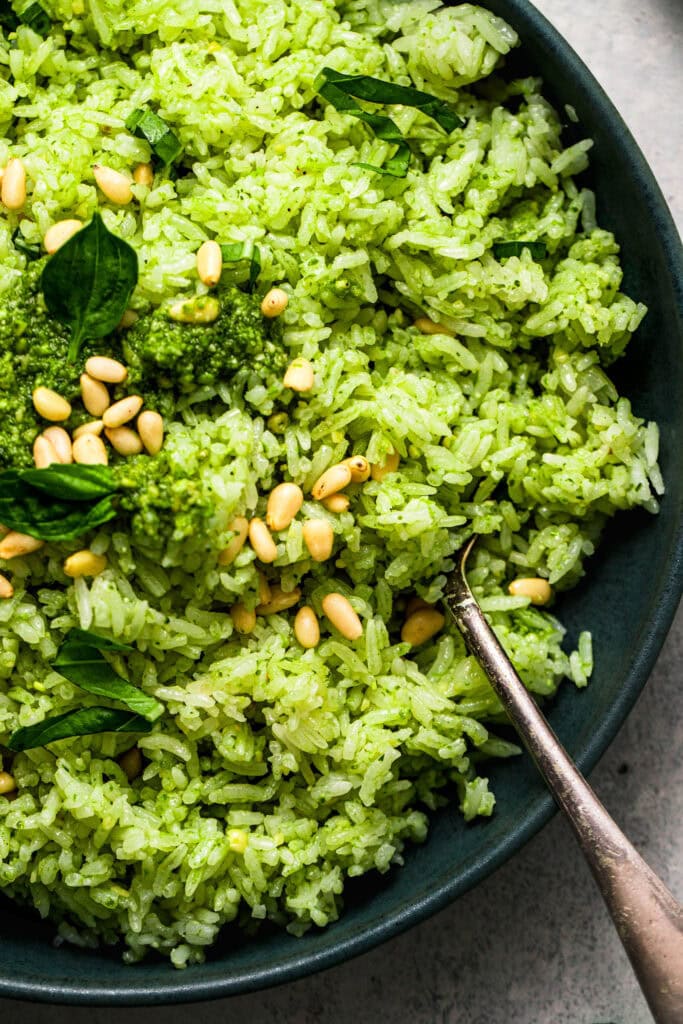 Overhead close up of finished green pesto rice.