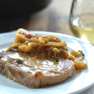 Pork Chops with Dijon-White Wine Sauce - A quick 30 minute dinner By Jessica Wood | platingsandpairings.com