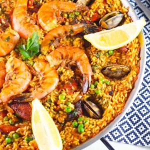 Seafood Paella with Saffron Aioli - This Paella is SURE to impress! | platingsandpairings.com