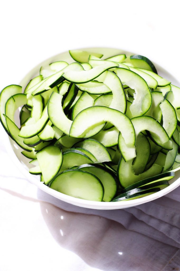 Cucumber Salad with Toasted Rice Powder - This Asian-inspired salad is tangy, crunchy and refreshing, not to mention, EASY to make!| platingsandpairings.com