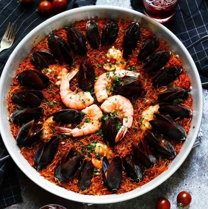 Have you tried Fideuá? It's like Paella, but made with broken pasta instead of rice. A Catalan specialty! | platingsandpairings.com