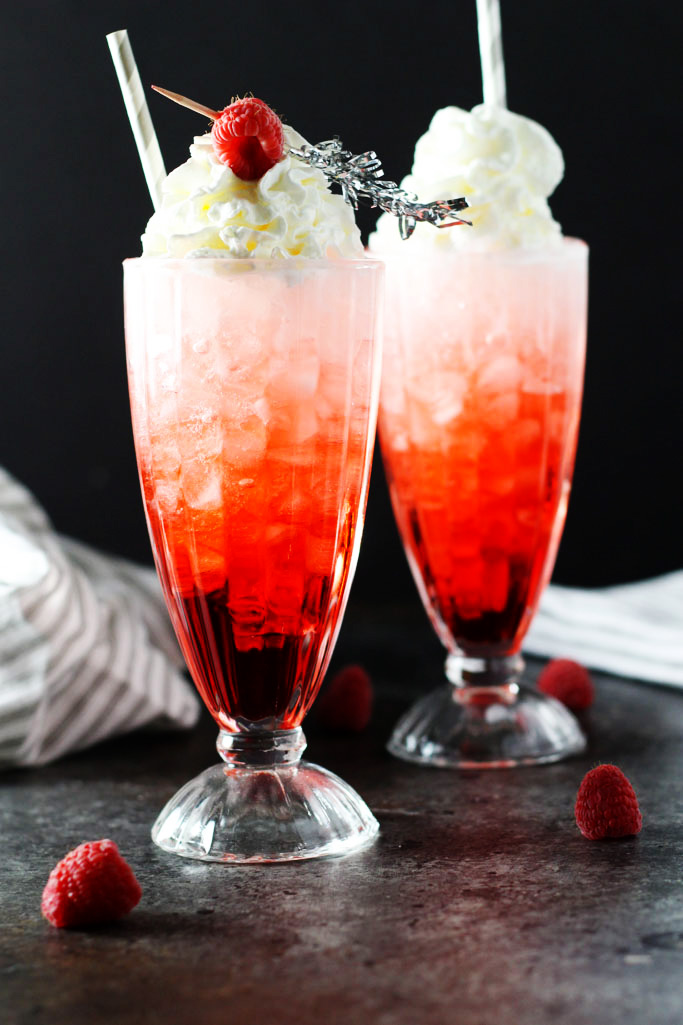 These Raspberry Cream Italian Sodas are DELICIOUS and easy to make with just three simple ingredients | platingsandpairings.com