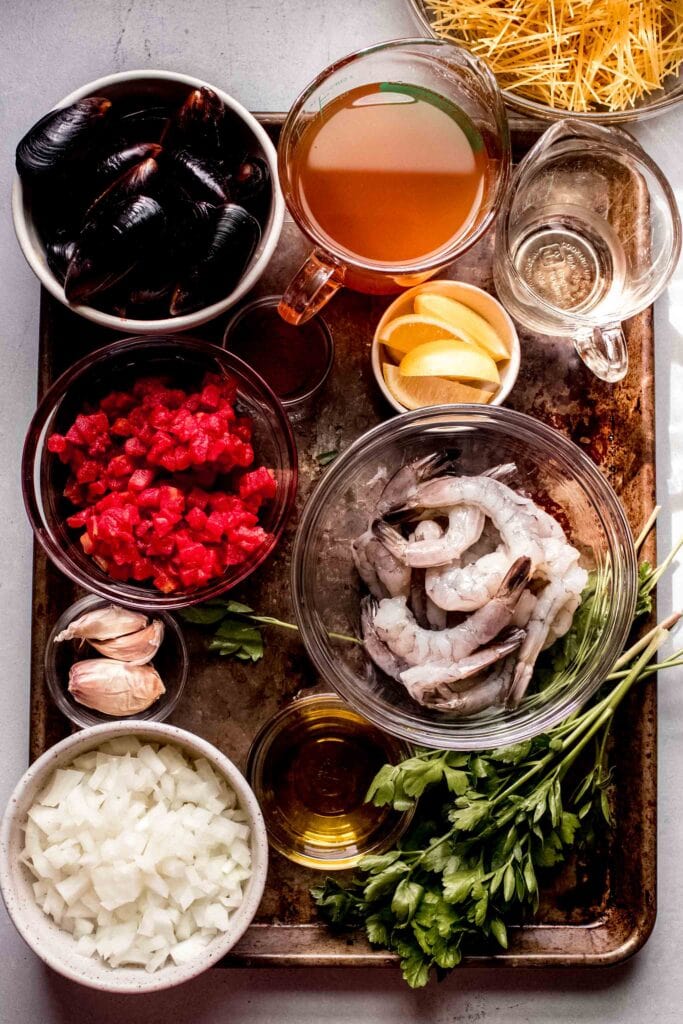 Ingredients for fideua on tray. 