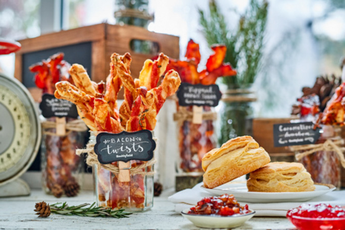 Learn how to create a DIY Bacon Bar - It's the perfect DIY solution for entertaining a crowd at breakfast or brunch! We’re taking bacon to the extreme with a variety of flavored bacons, bacon biscuits, bacon flavored salt and even bacon jam. | platingsandpairings.com