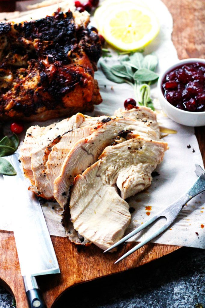 Follow this game plan for an easy small scale Thanksgiving dinner. Roasted bone-in turkey breast, stuffing, mashed potatoes, glazed carrots and even pumpkin pie for dessert! | platingsandpairings.com