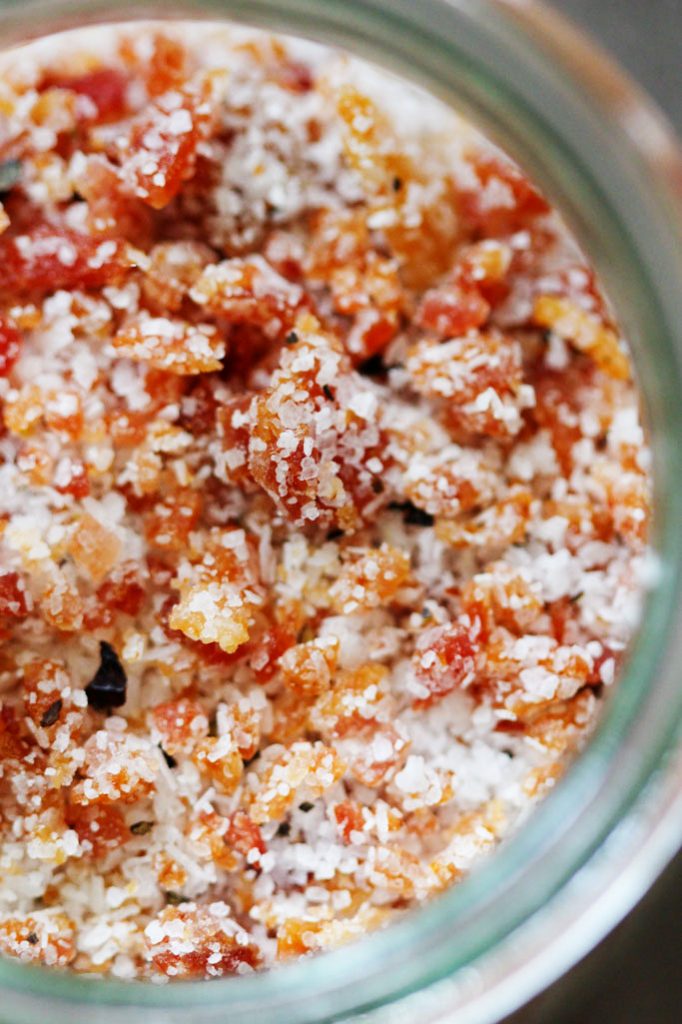 This Homemade Bacon Salt is perfect for sprinkling on popcorn, rimming a Bloody Mary, or finishing off a steak. Plus, it makes a great DIY gift! | platingsandpairings.com