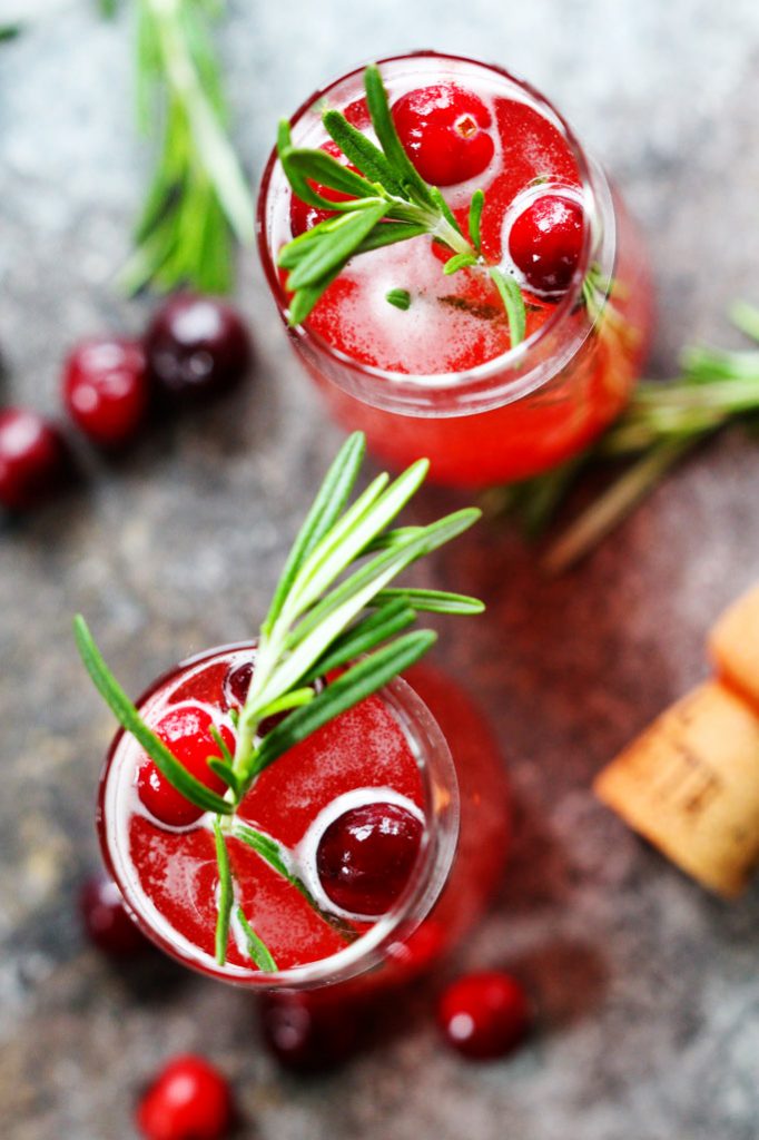 This Cranberry Ginger Bellini is a festive sparkling cocktail that's perfect for brunch or holiday parties. | platingsandpairings.com