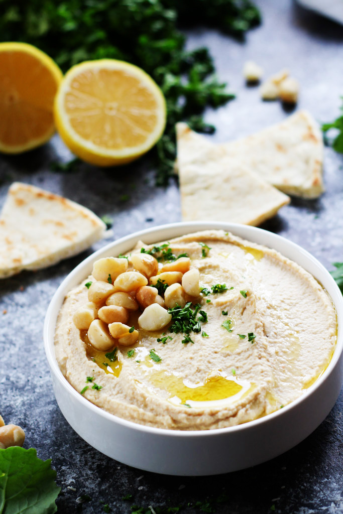 Macadamia Nut Hummus puts a Hawaiian spin on the traditional chickpea spread– It’s rich, creamy, tangy and perfect for slathering on sandwiches or serving as an appetizer dip with vegetables. | platingsandpairings.com