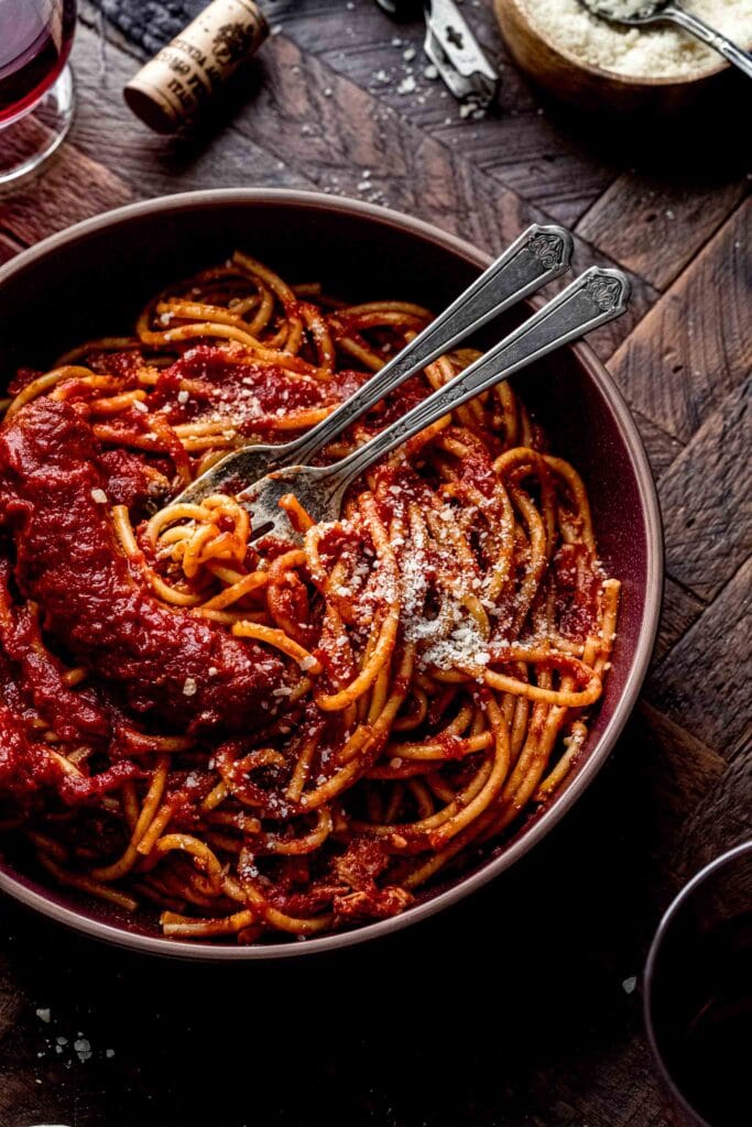 Side view of plate of sunday gravy. 