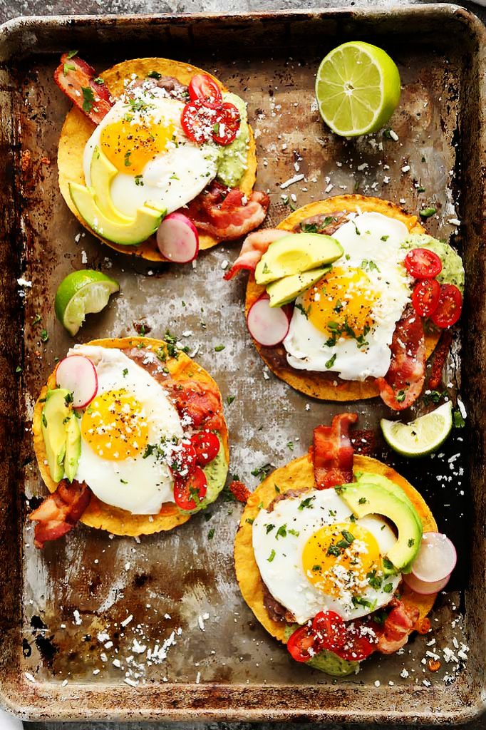 These Bacon Breakfast Tostadas are perfect for serving a group at brunch because everyone can customize their toppings & the style of eggs that they prefer. | platingsandpairings.com