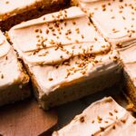 Pan of sliced blondies with spatula.