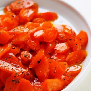 These are the BEST Glazed Carrots! Lightly sweetened, delicately seasoned & perfectly glazed. They make an amazing side dish that both kids & adults love. | platingsandpairings.com