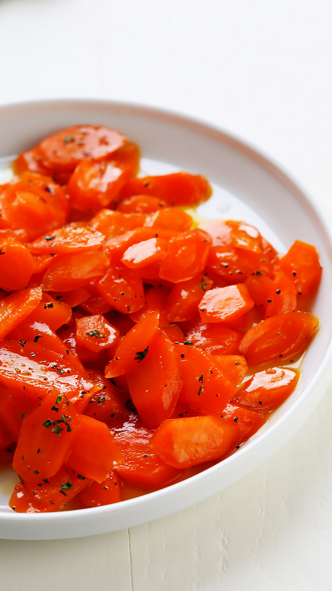 These are the BEST Glazed Carrots! Lightly sweetened, delicately seasoned & perfectly glazed. They make an amazing side dish that both kids & adults love. | platingsandpairings.com
