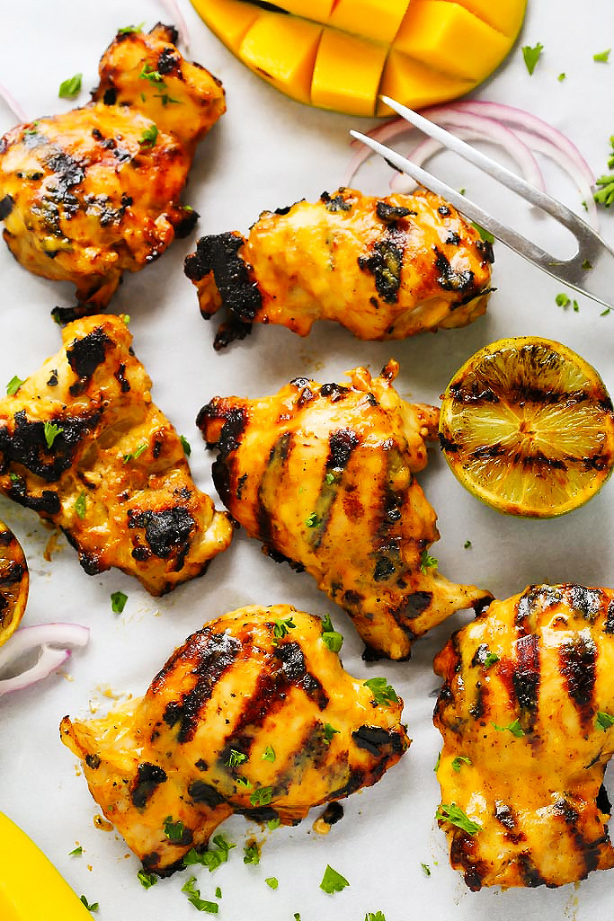 Mango Lime Grilled Chicken features a sweet and spicy mango lime marinade that caramelizes perfectly on a hot grill. It's perfect for your summer BBQ. | platingsandpairings.com