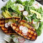 Grilled Swordfish with Tangy Rosé Wine Mayonnaise will take your grilling to the next level. Grilled swordfish is topped with rosé wine mayonnaise that is also turned into a creamy vinaigrette used to dress a simple & refreshing salad of fennel, radish and avocado. | platingsandpairings.com