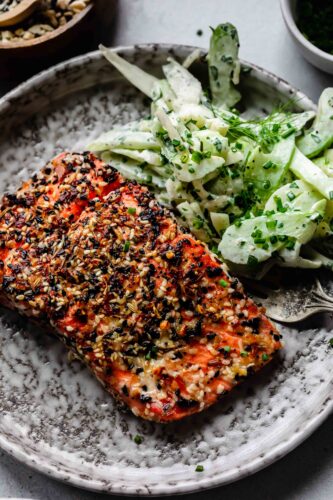 Everything bagel salmon on plate with fennel salad.