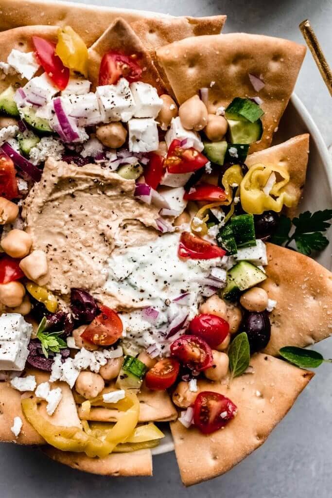 Overhead close up of platter of greek nachos. 