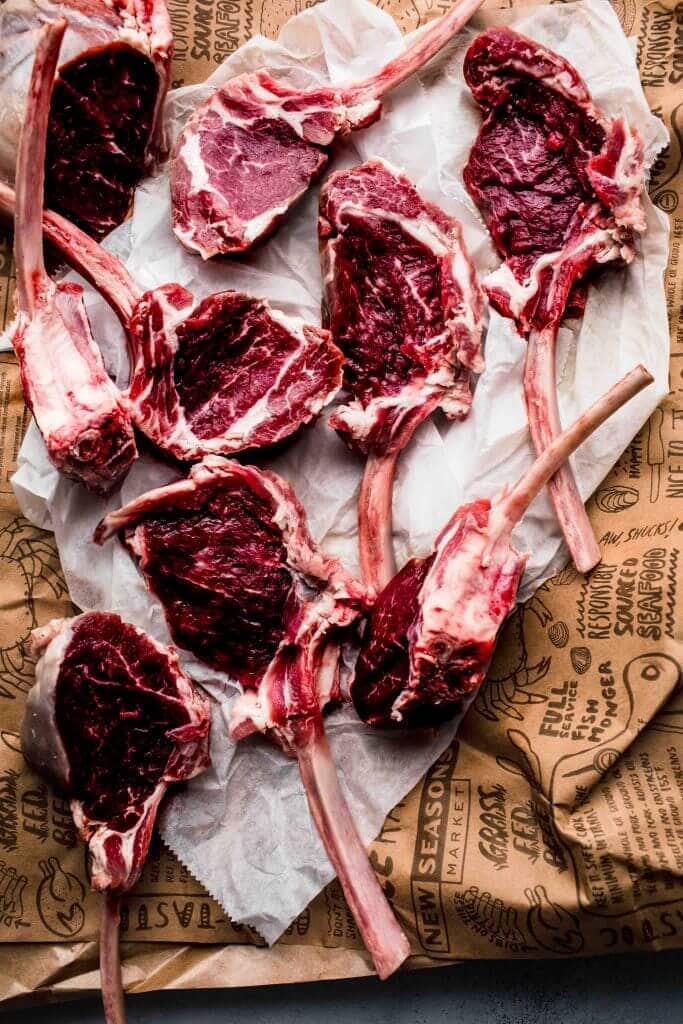 Lamb chops arranged on butcher's paper. 