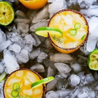 This Mango Michelada is a Mexican beer cocktail that’s sweet and spicy and perfect for summer sipping! | platingsandpairings.com