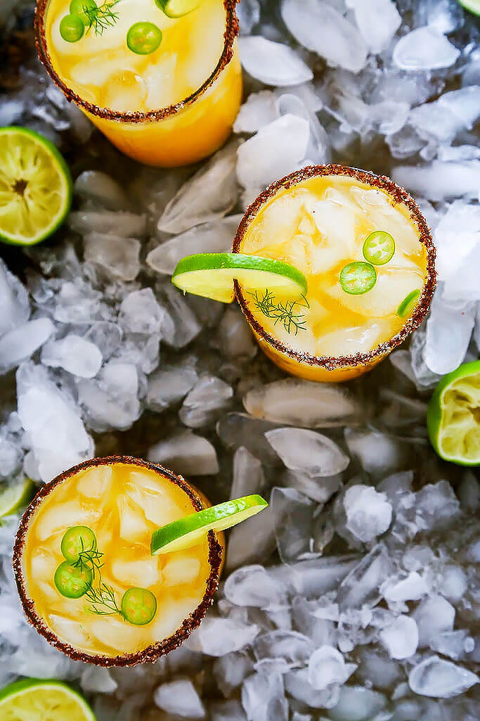 This Mango Michelada is a Mexican beer cocktail that’s sweet and spicy and perfect for summer sipping! | platingsandpairings.com