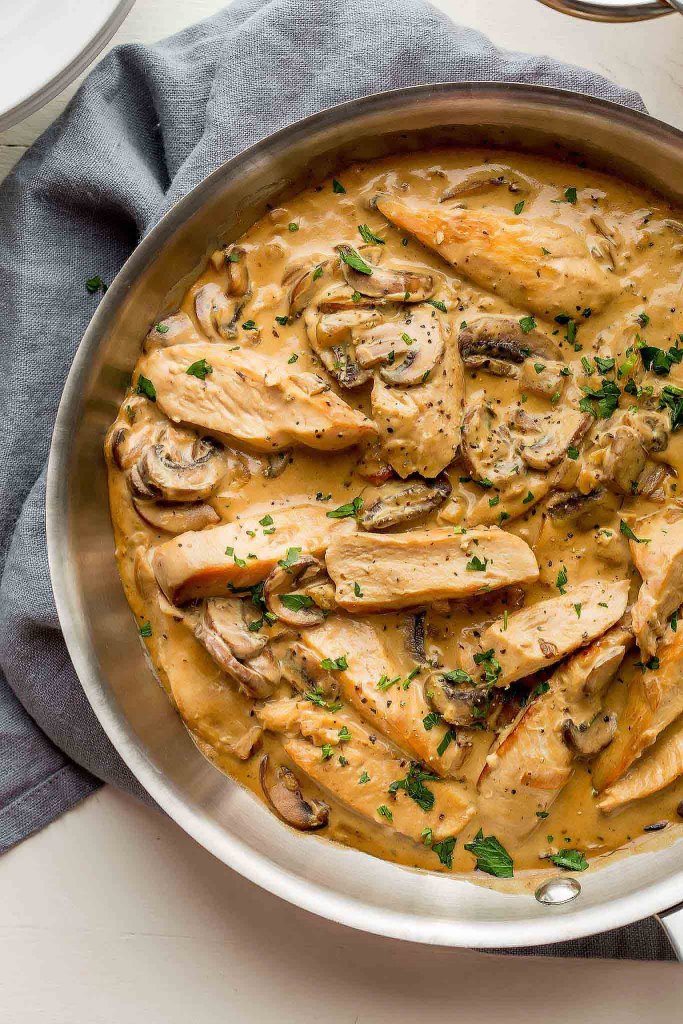 This chicken marsala recipe adds in dijon mustard & creamy mascarpone cheese. It’s a rich dish that's easy to prepare but totally impressive. | platingsandpairings.com