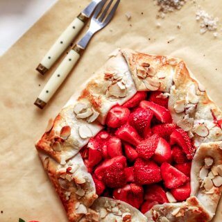 This rustic Strawberry Galette is a quick and easy dessert recipe that can be assembled in just 10 minutes using store-bought, refrigerated pie crust. | platingsandpairings.com