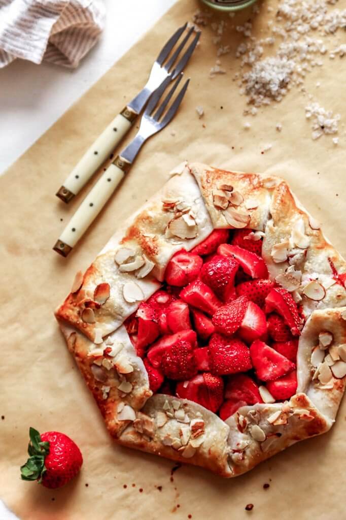 This rustic Strawberry Galette is a quick and easy dessert recipe that can be assembled in just 10 minutes using store-bought, refrigerated pie crust. | platingsandpairings.com