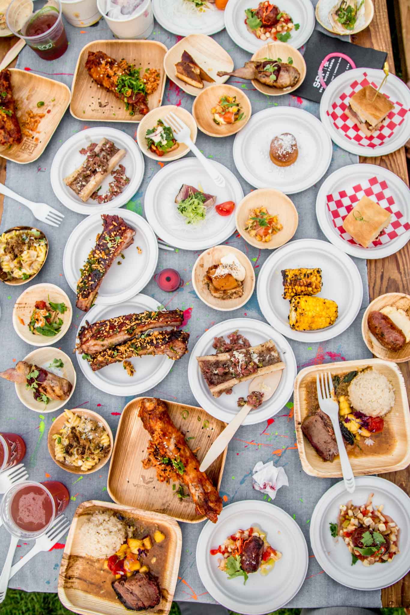 FEAST Portland - Overhead shot of table filled with lots of small plates of food. 