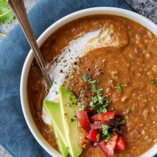 Slow Cooker Chipotle Lentil Soup is a warm and comforting hearty soup that’s perfect for chilly Fall days! The chipotle peppers give it a bit of heat and a great smoky flavor. | platingsandpairings.com