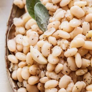 Close up of Italian White Beans with sage.
