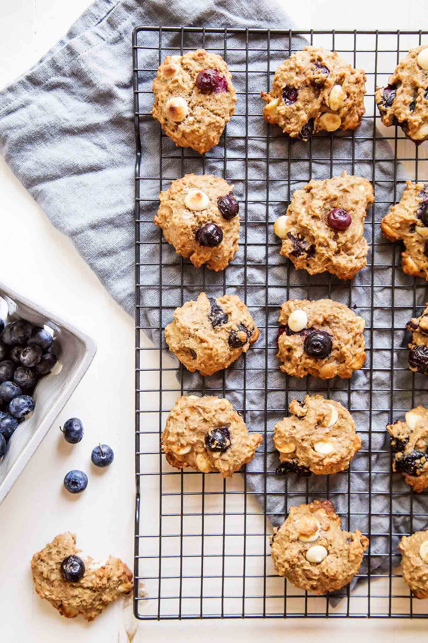 Close up of quinoa breakfast cookies, one with bite taken