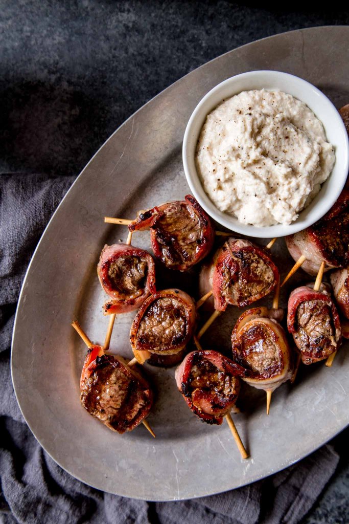 filet mignon bites on platter with creamy horseradish