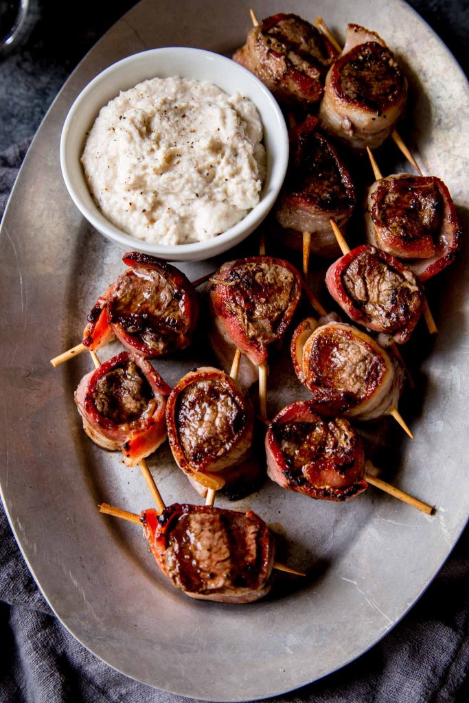 filet mignon bites on platter with creamy horseradish