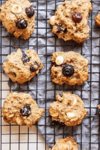 Close up of blueberry breakfast cookies on cooling rack.