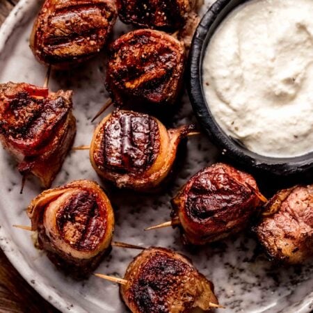 Plate of filet mignon bites ready to be served.