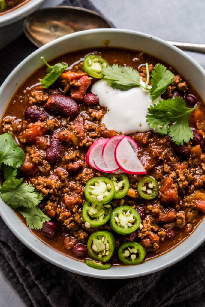 Overhead close up of bowl of spicy beer chili. 