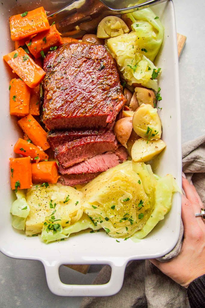 This Instant Pot Corned Beef & Cabbage is made with the help of your electric pressure cooker and finished off under the broiler with a honey-dijon glaze, giving it a perfectly crispy exterior. 