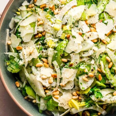 Overhead close up of fennel celery salad in bowl.
