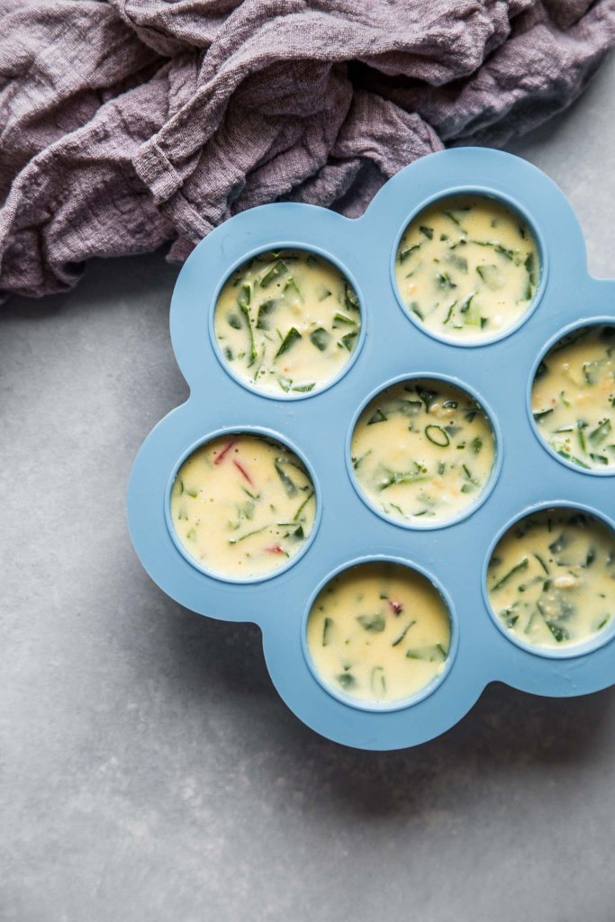 Instant pot sous vide egg bites in silicone mold ready to be cooked in pressure cooker.