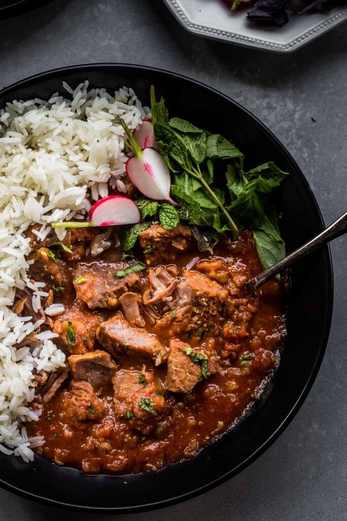 Close up Overhead shot of instant pot persian beef stew in bowl with rice