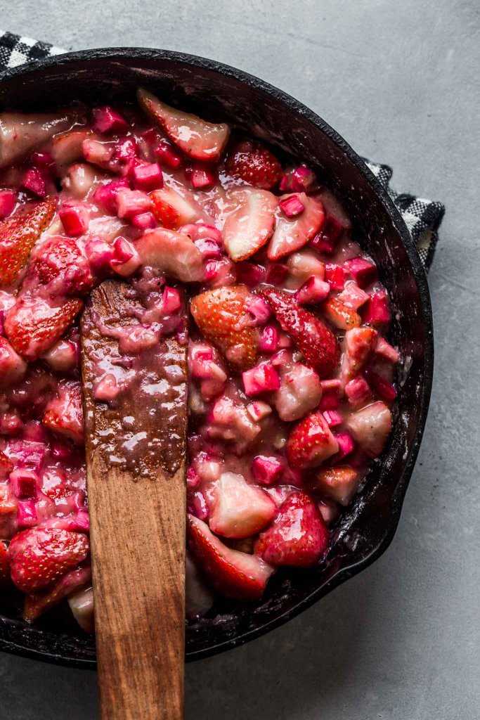 Sauteed strawberries and rhubarb in skillet. 
