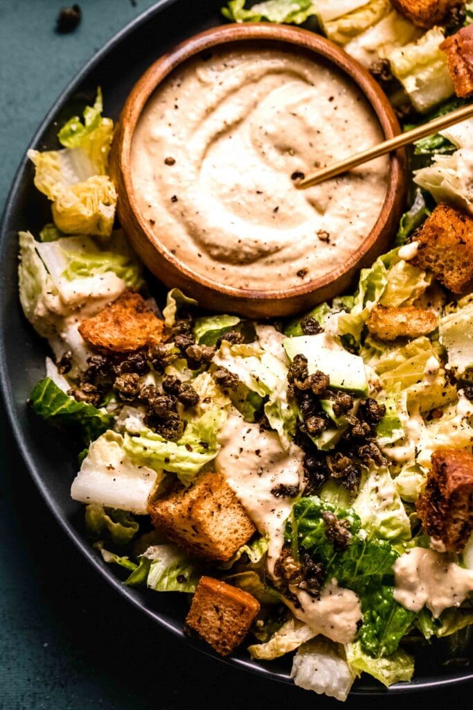 Overhead close up of vegan caesar on serving plate.