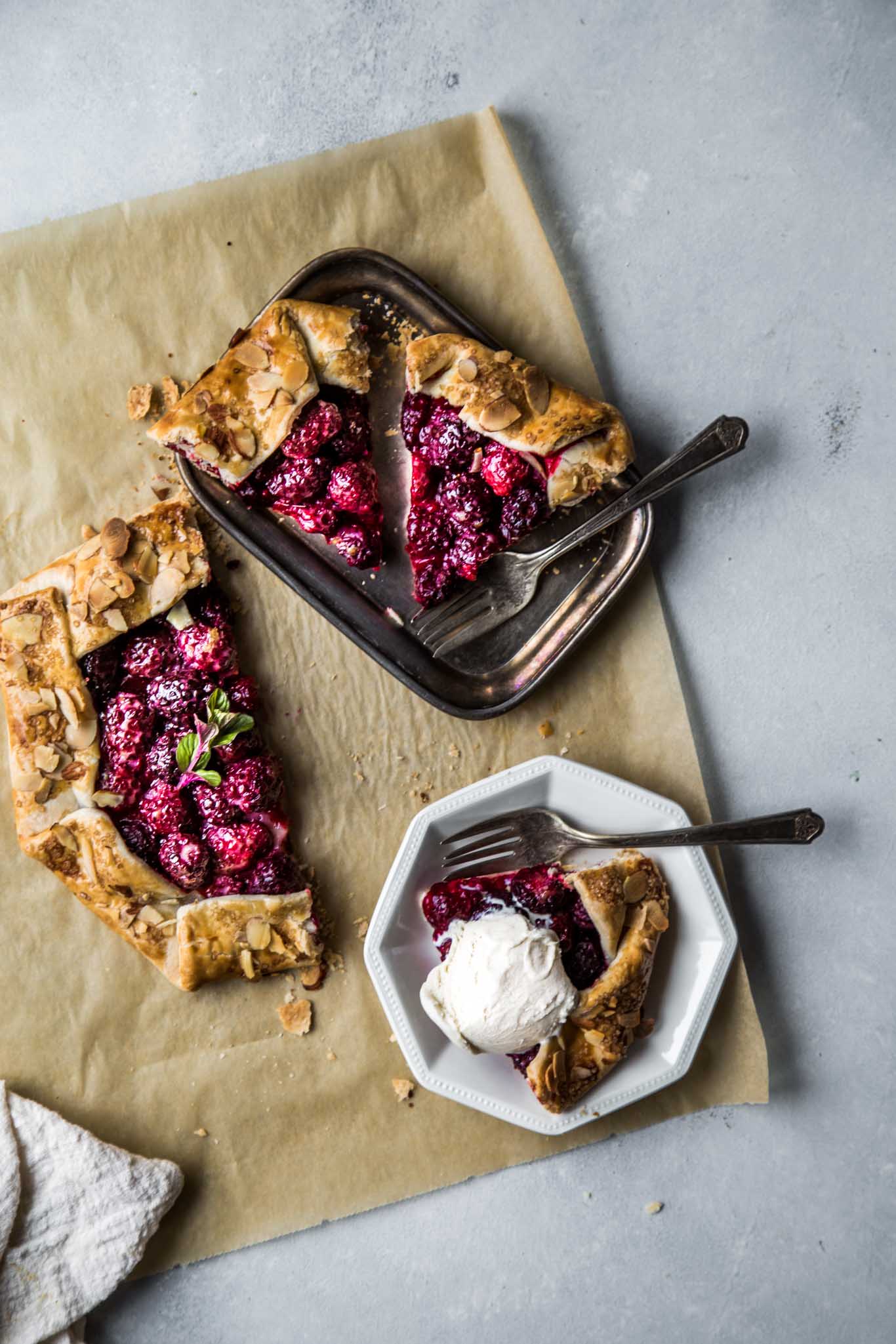 Blackberry galette sliced and ready to serve.