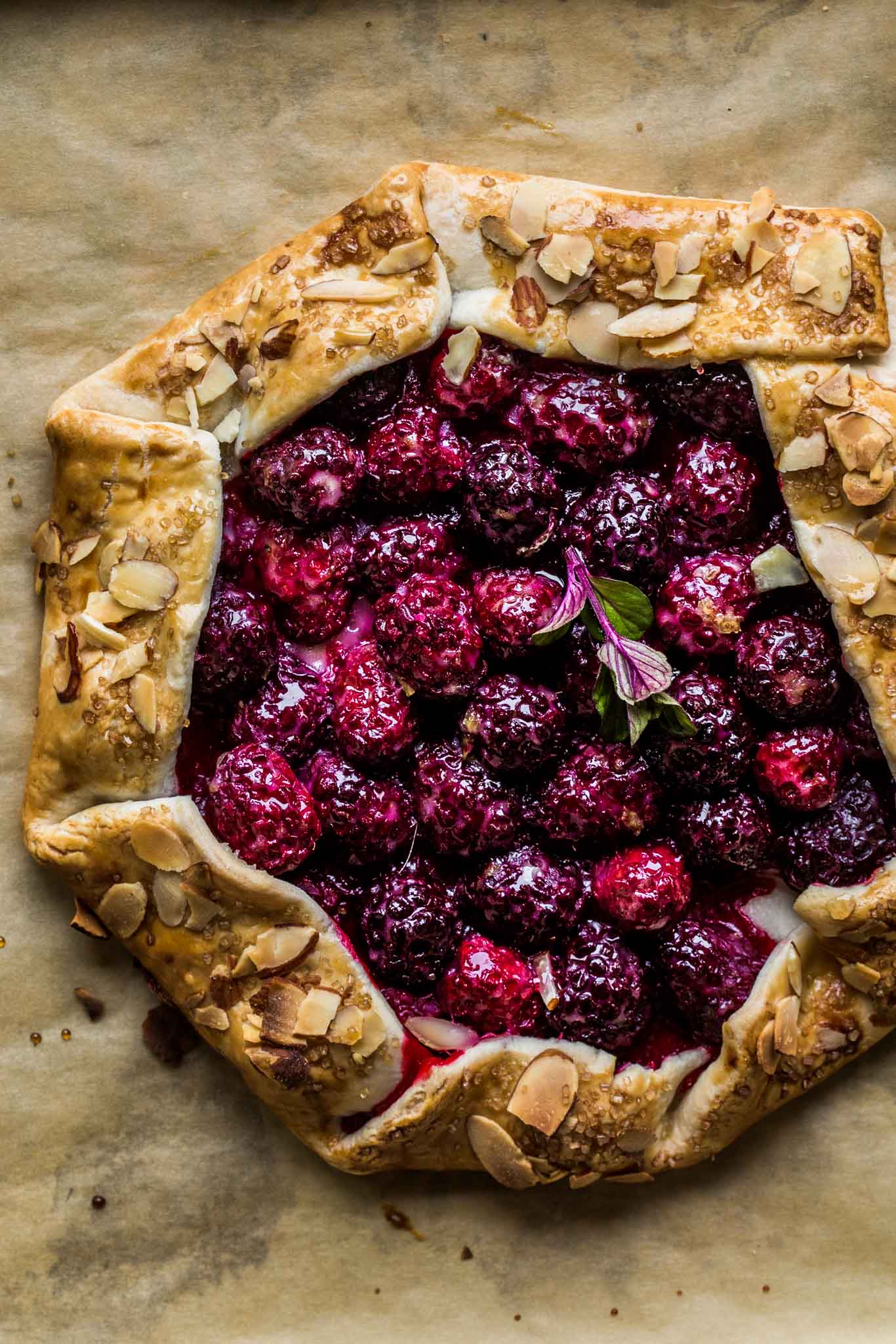 Overhead shot of full galette on parchment.