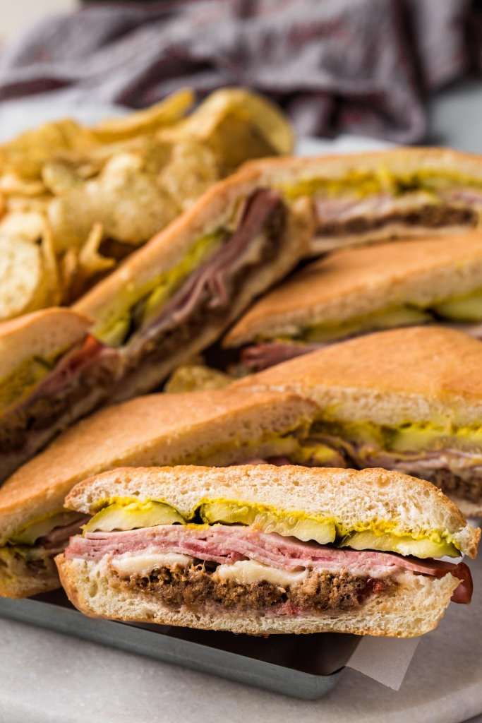 Cut sheet pan cubano sandwich.
